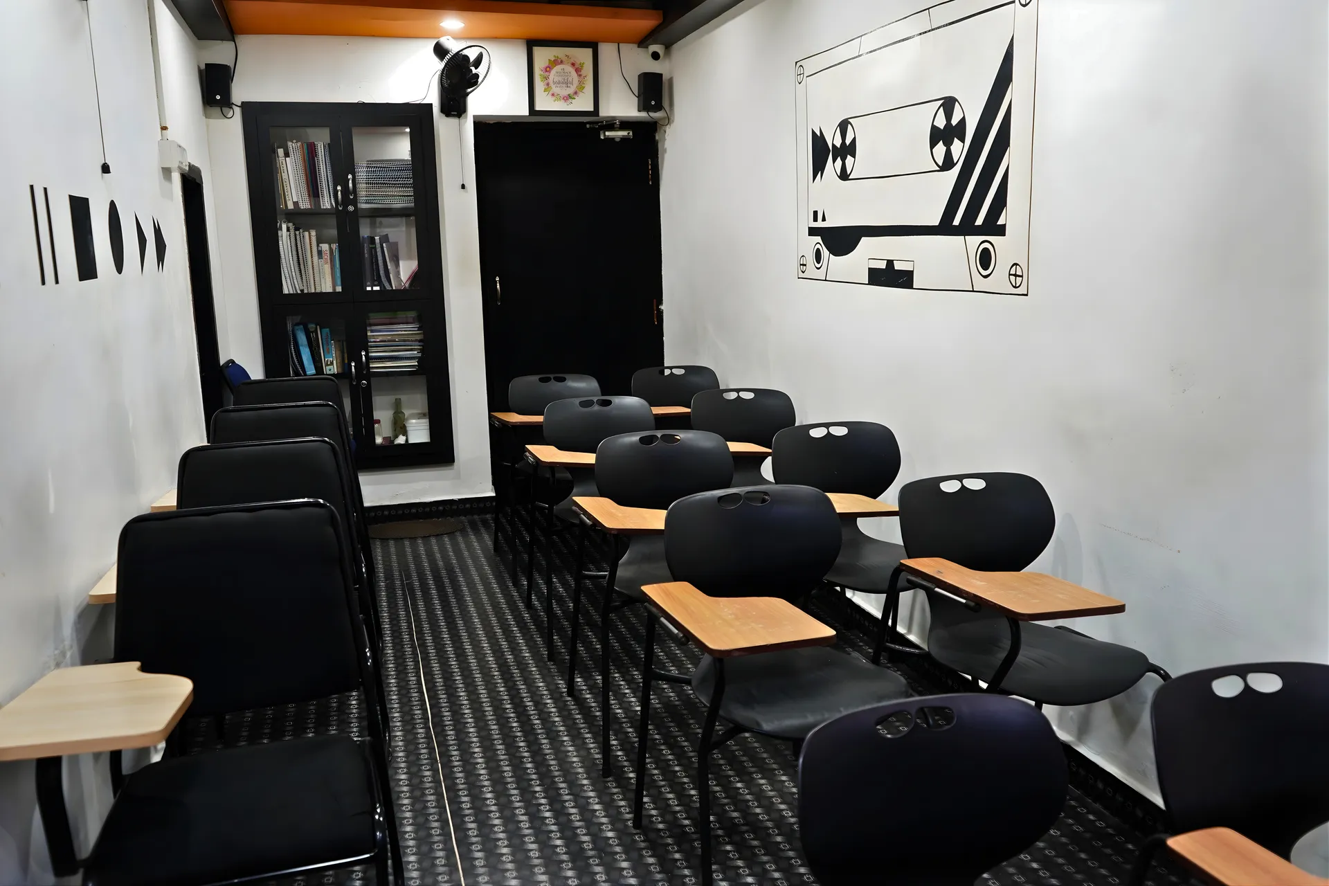 Well-lit classroom with PPT presentation setup at Soundpoint Pro